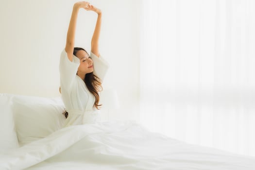 Portrait beautiful young asian women smile happy on bed photo