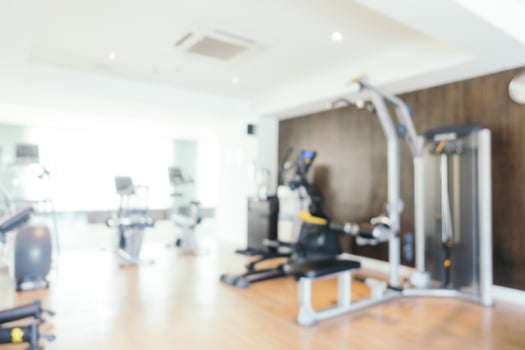 Abstract blur fitness equipment and gym photo