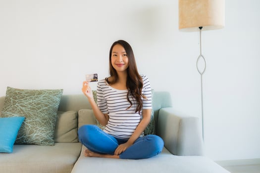 Portrait beautiful young asian women with credit card mobile phone or computer for shopping photo