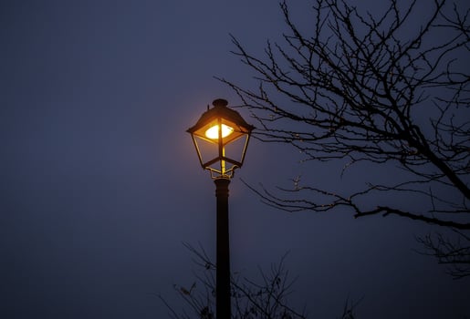Streetlight with dusk sky photo