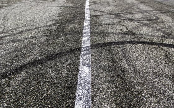 Wheel tracks on street photo