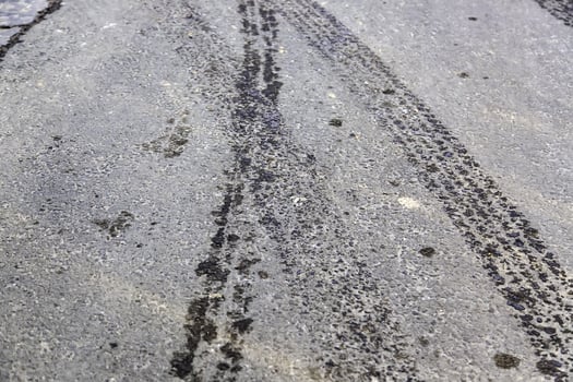 Wheel tracks on street photo