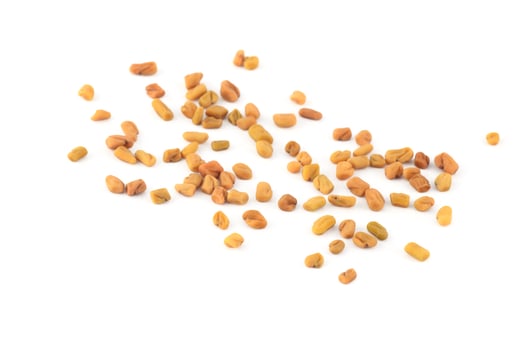 Fenugreek seeds isolated on white background photo