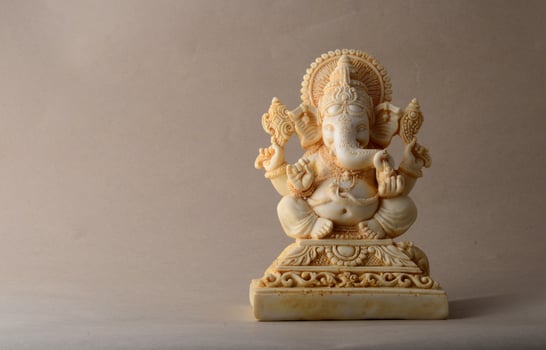 Hindu God Ganesha. Ganesha Idol on background photo