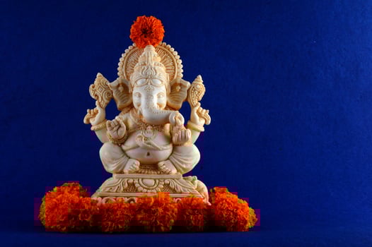 Hindu God Ganesha. Ganesha Idol on blue background photo