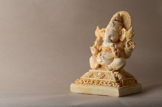 Hindu God Ganesha. Ganesha Idol on background photo