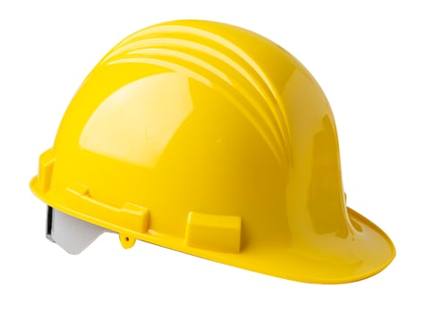 Yellow construction helmet isolated on white background with clipping path, engineer safety concept. photo
