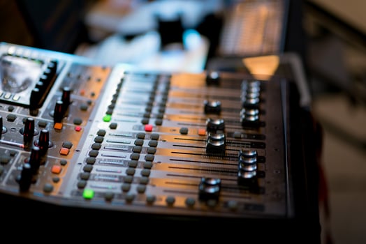 Sound check for concert, mixer control, music engineer, backstage photo