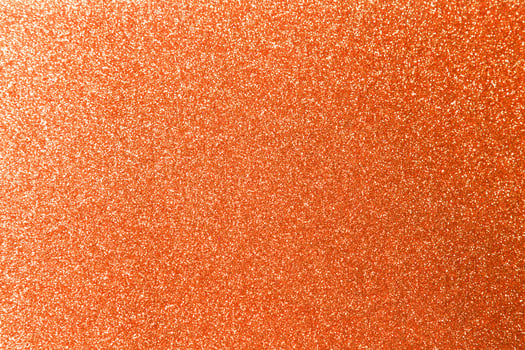 Orange glitter texture background photo