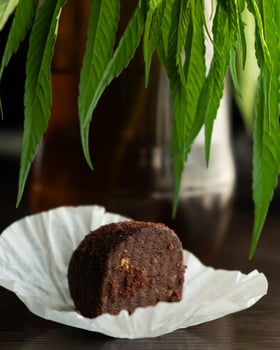 sweet cannabis chocolate brownie, recreational food with marijuana photo