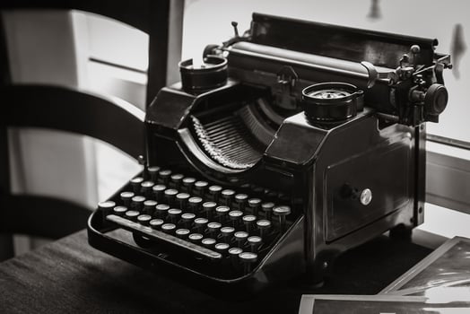 antique manual typewriter on the table photo