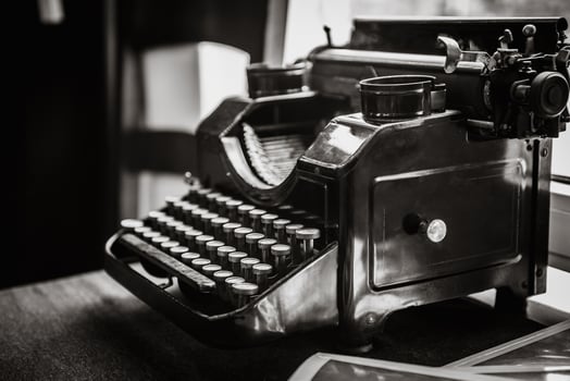 antique manual typewriter on the table photo