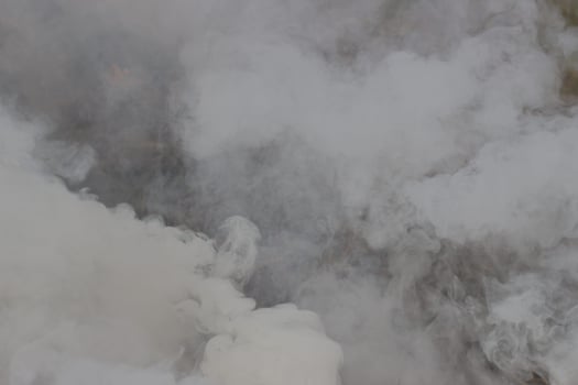 Gray smoke during a fire close-up. photo