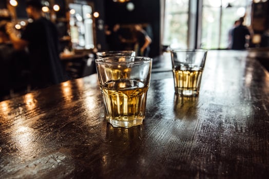 glasses of whiskey on the table photo