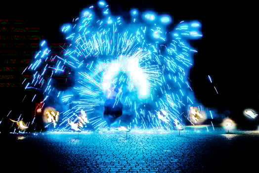 fiery pieces of a fire show photo