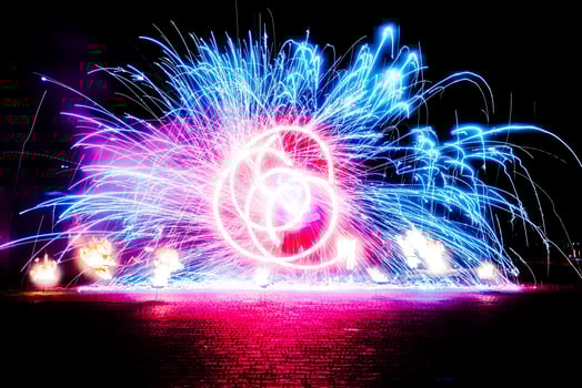 fiery pieces of a fire show photo