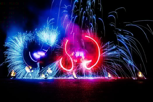 fiery pieces of a fire show photo