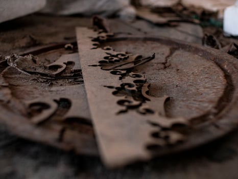 abstract wooden pattern on rusty iron cover on the ground photo