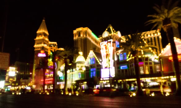 high energy electric long exposure of las vegas city streets at night photo