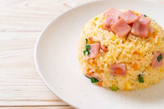 Homemnade fried rice with ham on plate photo