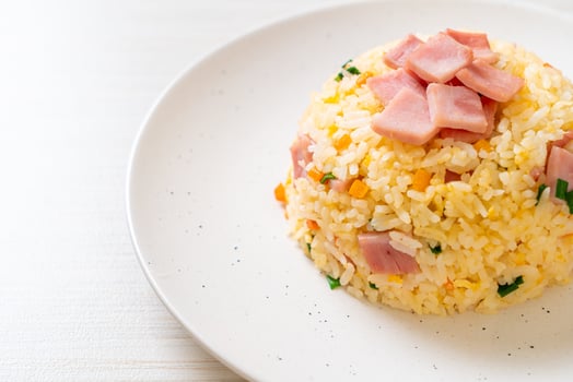 Homemnade fried rice with ham on plate photo