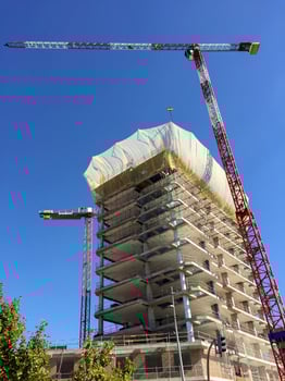 Construction cranes in Madrid, Spain photo