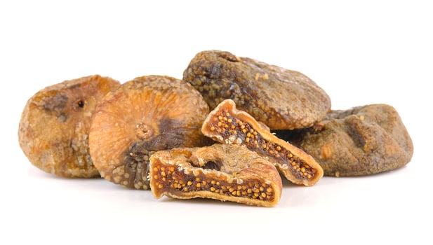 Dried figs isolated on a white background photo