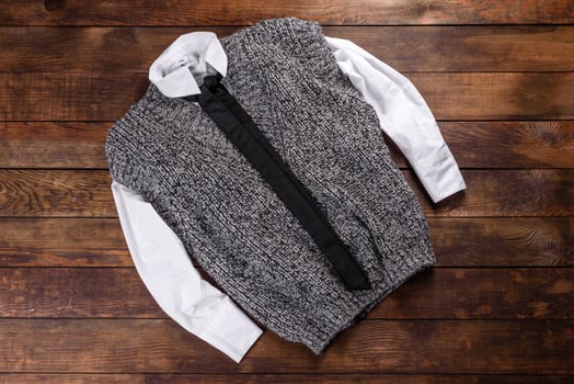 Knitted sweat made of woolen threads on a dark background photo