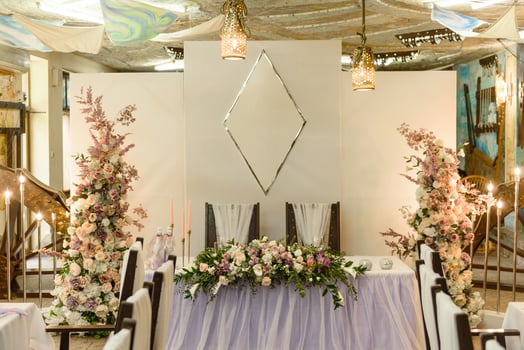 Beautiful floral compositions in the restaurant for the wedding ceremony photo