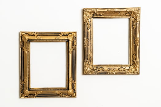 Empty picture frame on white wall background with copy space photo