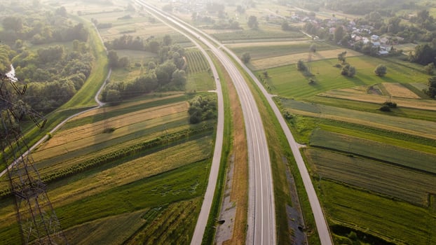 Aerial view of local road during summer day photo