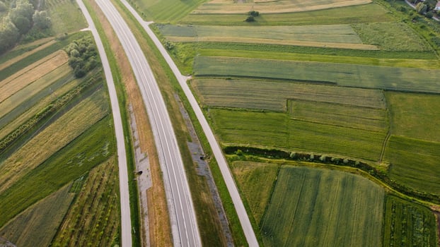 Aerial view of local road during summer day photo