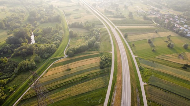 Aerial view of local road during summer day photo