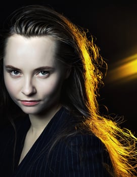 Portrait of a young beautiful girlmetics and fashionable style. photo