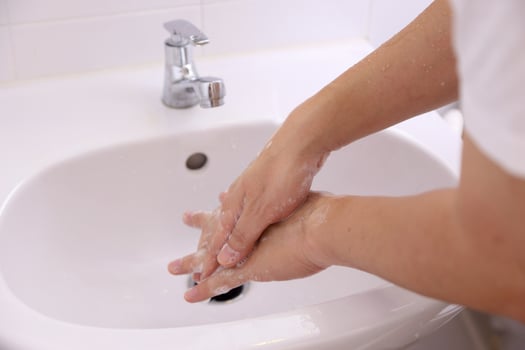 Hand Washing in Washbasin photo