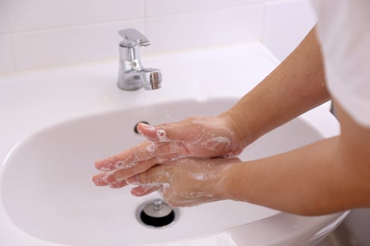 Hand Washing in Washbasin photo