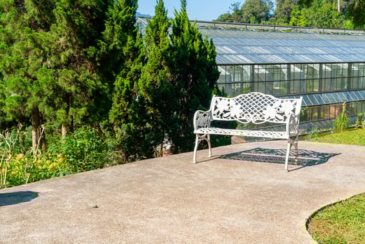 Empty white chair in the garden photo