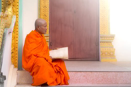 Monks in Thailand are reading books photo