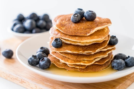 Stack of pancakes with fresh blueberry photo