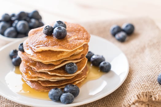 Stack of pancakes with fresh blueberry photo