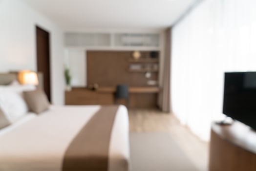Abstract blur beautiful luxury hotel bedroom photo