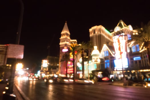 high energy electric long exposure of las vegas city streets at night photo