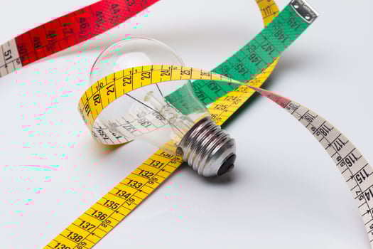 Yellow flexible tape measure photo