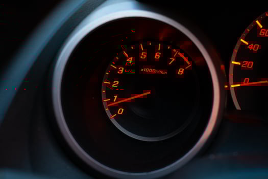 Close up of car speedometer with the needle pointing at  1 krpm photo