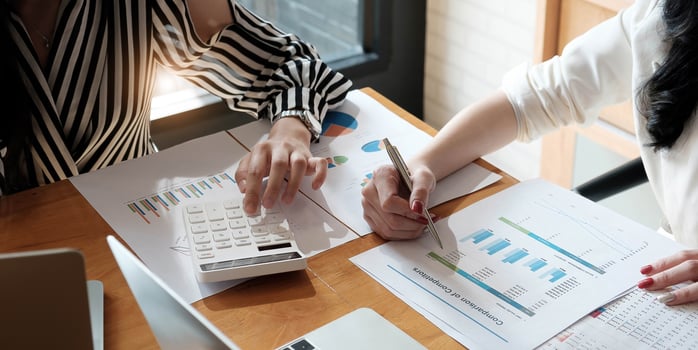 financial advisory services. Group of business advisor showing plan photo