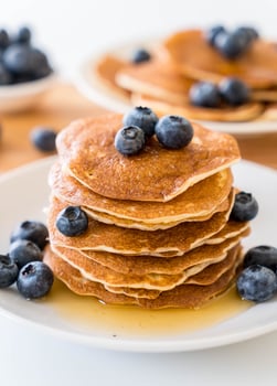 Stack of pancakes with fresh blueberry photo