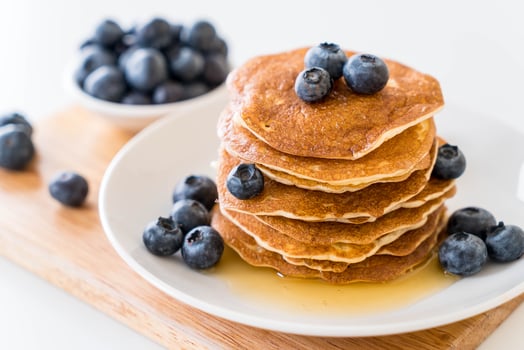 Stack of pancakes with fresh blueberry photo