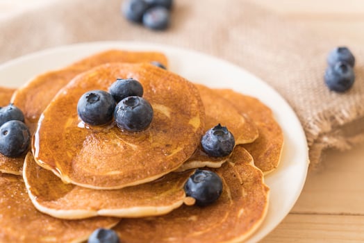 Stack of pancakes with fresh blueberry photo