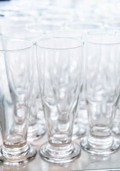 Many empty glasses in a line photo