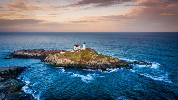 Nubble lighthouse at sunset photo